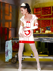 Wicked nurse Starri Knight letting large bra buddies free from latex uniform