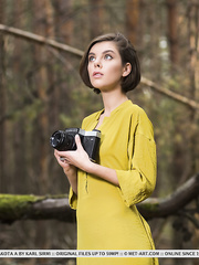 Dilettante photographer Dakota A exposes her undressed legal age teenager cunt in the forest