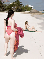 Large boobed lesbo Christy Marks seduces a breasty female for sex on the beach