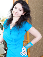 Juvenile dark brown model Ramira widening bare to disclose incredibly curly fur pie