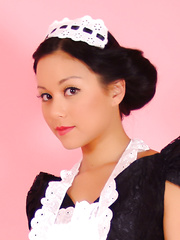 Pinup model Petra Lily So doffs her maid outfit to go topless