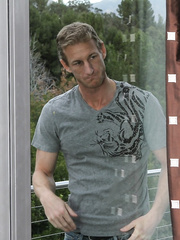 Golden-Haired masseuse Mia Ryder negotiates details of nuru massage in a satin robe