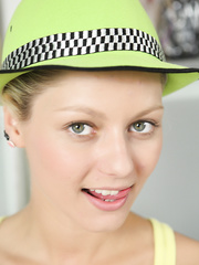 Fine legal age teenager Pinky June dildos her stretched out snatch in striped socks and a hat