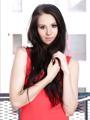 Very hawt darksome haired beauty lifts her red costume to finger her excited pussy