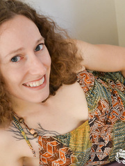 Dilettante model shows her full bush in the undressed with painted toenails