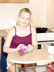 Barely legal golden-haired legal age teenager fingers her constricted cum-hole on the kitchen floor