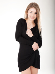 Natural golden-haired with a mind boggling smile Verona J disrobes to model in the bare