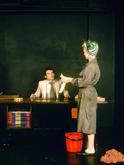 Chic blond dresses as cleaning staff to seduces her boss in a red suit