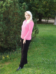 Mature blond woman Sweetsusi undresses nude on public playground