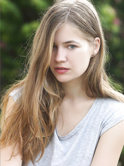 Youthful gorgeous face angel removed her undies and shirt to sunbathe exposed