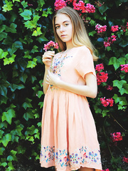 Enchanting slim legal age teenager Shayla discloses her widen cum-hole and petite butt in the garden