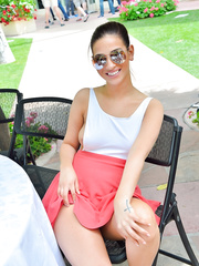 Dressed angel teases at an outdoor convention with nip slide and panty upskirts