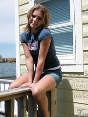 Cute youthful Karen squats on the pier to flash a sexy cotton panty upskirt