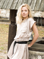 Juvenile golden-haired beauty shows off her worthy booty and snatch at a wishing well