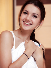 Slim solo angel slips pants over lengthy legs whilst undressing