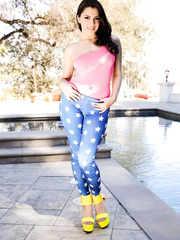 Dark Brown solo model Valentina Nappi slips her leggings over her hot arse