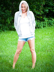 Pierced dilettante Nikki Sims with hard nipps in soaked shirt & strap in the yard