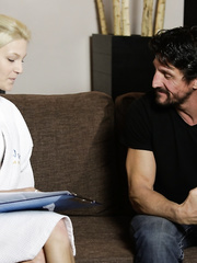 Blond masseuse Hope Harper gives her aged male client an erotic massage