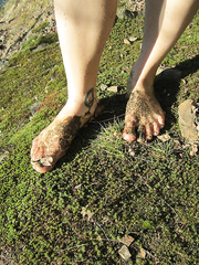 Russian girls swimming in lake and sunbathing leaf covering modesty