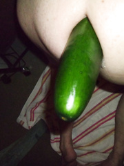 Huge cucumber stretching my ass real good biggest one yet