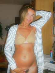 Sexy woman at the beginning of her pregnancy amateur photos