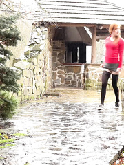 Redhead Sandra lifts her petticoat to take a lengthy hawt pee in public