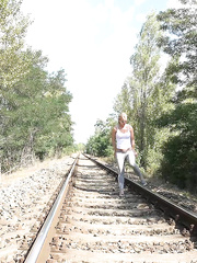 Blond cutie LickyLex pulls down her panties & squats to pee on the educate tracks