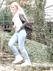Juvenile angel with lengthy golden-haired hair Katy Sky pulls down her jeans to pee outside