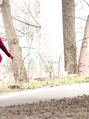 Cute redhead Lanna pulls down her taut jean to take a make water outside