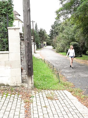 Hidden voyeur catches a cuties taking a urinate behind a cinder block wall