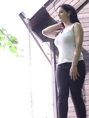 Lalin Girl female Alex Darksome pulls down her yoga panties for an urgent pee on steps