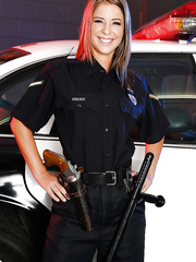 Sassy honey in police uniform undressing and widening her legs