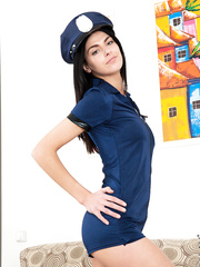 Slender solo cutie removes cop hat prior to finger widening her juicy love tunnel