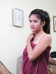 Youthful Oriental cutie drips cum from trimmed bawdy cleft after POV sex with a Farang