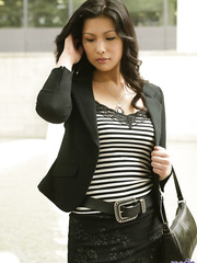 Japanese beauty Chinami stands stripped after not fast getting naked