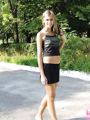 Ribald blond non-professional wears no pants below her darksome petticoat