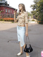 Cute legal age teenager gal walks around eating food and flashing no panty upksirts