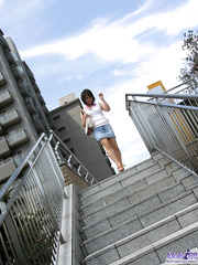 Juvenile looking Japanese cutie sinks her stripped body into a tub of bathwater