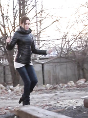 Dressed honey exposes beefy labia lips during the time that taking a void urine outdoors