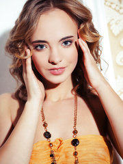 Glamorous brunette hair minx Rachel enjoys showing off her constricted body