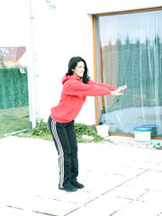 Darksome haired legal age teenager attends to slutty vagina with a sucker in the kitchen