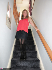 Foxy mother I'd like to fuck Lily May displays her large butt and widens love tunnel on the stairs