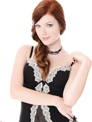 Natural redhead Mia Sollis slides off hot underware to pose undressed in nylons