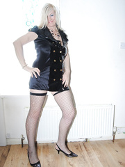 Aged golden-haired frees her saggy milk sacks and hairless vagina from latex in mesh hosiery