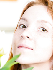 Pale redhead puts her bald legal age teenager love tunnel on display on her much loved chair
