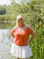 Chubby golden-haired woman with big milk shakes Melody acquires stripped on lakeside dock