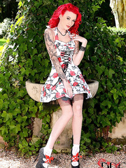 Inked redhead sweetheart Becky Holt baring large melons in heels and socks outdoors