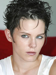 1St timer with short hair disrobes nude on a red bed for 1st in nature's garb positions