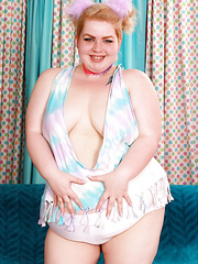 SSBBW Velma Voodoo wears her hair up in puffs during the time that parting her cunt