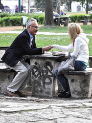 Youthful golden-haired hotty wears a ribbon in hair whilst having sex with an old stud